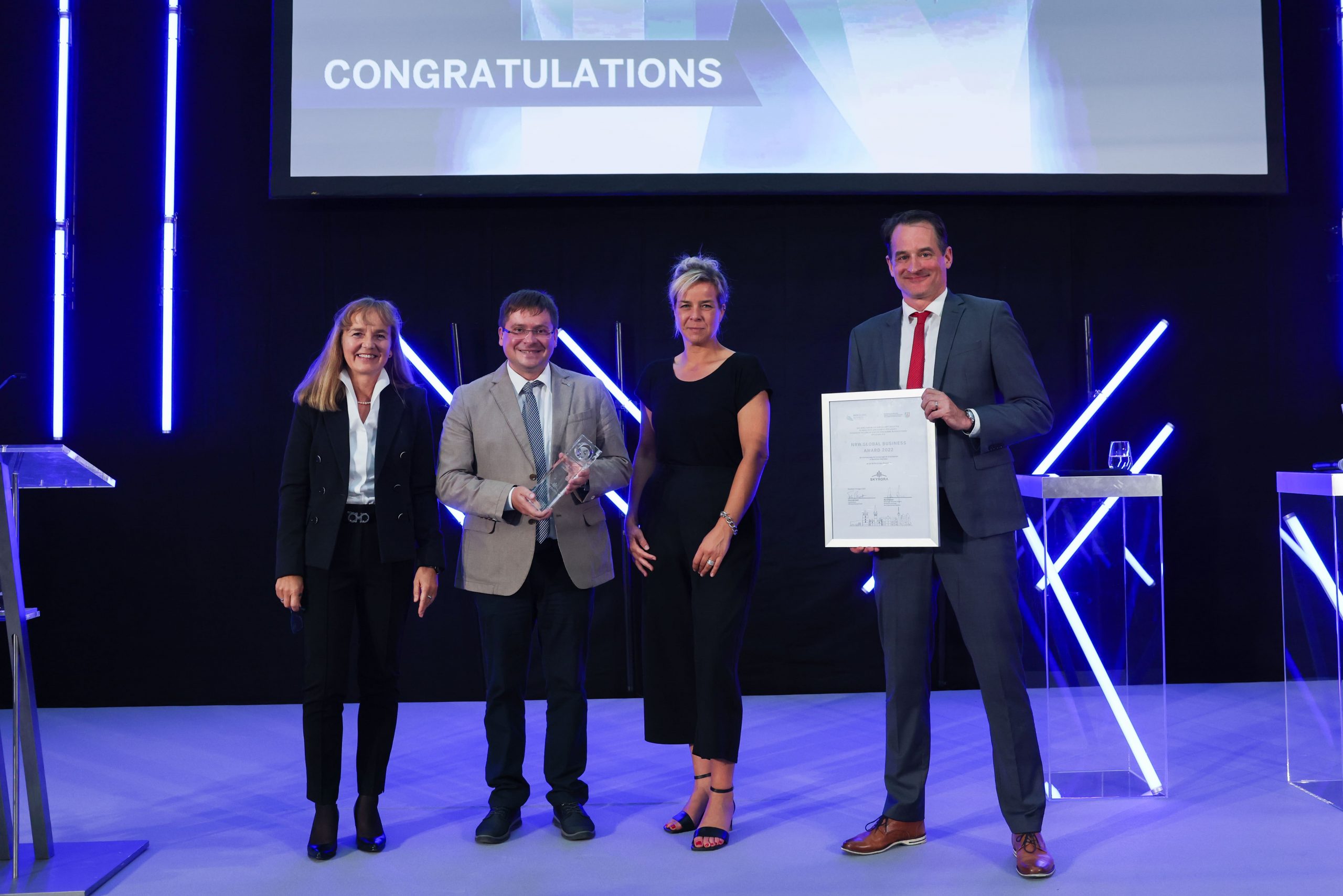 NRW.Global Business Award 2022 Skyrora team member Olexandr Grydin receiving award from Ms. Mona Neuba, Mr. Felix Neugart and Ms. Petra Pigerl-Radtke.