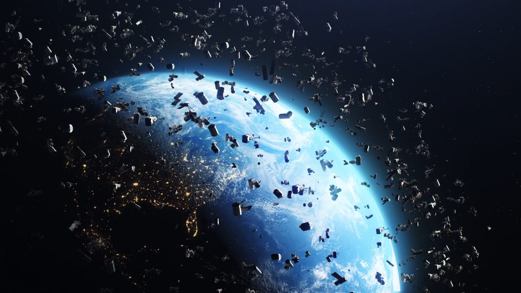 An image of Earth as seen from space, orbited by space junk.